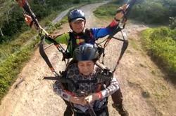 87-year-old daredevil creates buzz online for paragliding in Ranau