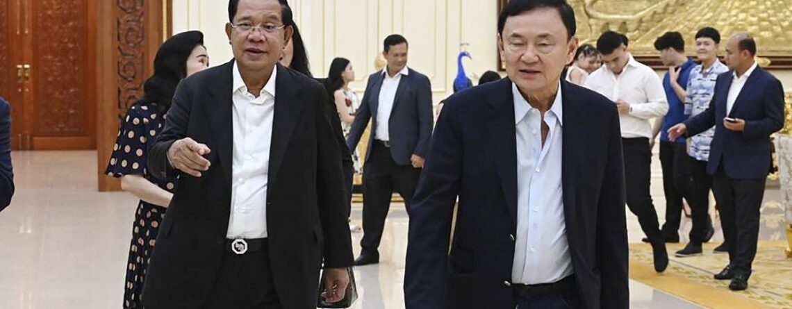 Cambodian Prime Minister Hun Sen (left) walks together with former Thai Prime Minister Thaksin Shinawatra, right, during a meeting at Hun Sen's residents in Takhmua, Kandal province southeast Phnom Penh Phnom Penh, Cambodia, Saturday, Aug. 5, 2023. Thaksin attended a birthday party for outgoing Cambodian Prime Minister Hun Sen in Phnom Penh, according to video posted online Sunday, Aug. 6, a day after Thaksin said he would delay plans to return to Thailand following years of self-imposed exile. - AP